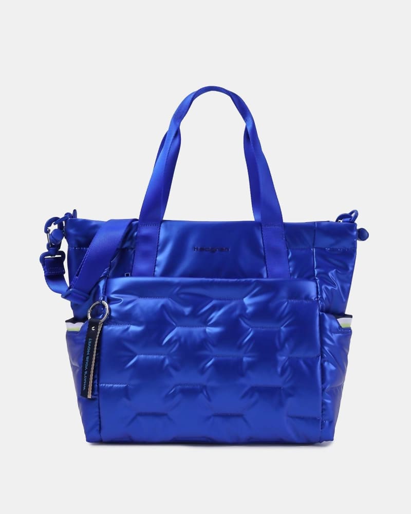Front of a model wearing a size O/S Puffer Tote Bag In Strong Blue in Strong Blue by Hedgren. | dia_product_style_image_id:358382
